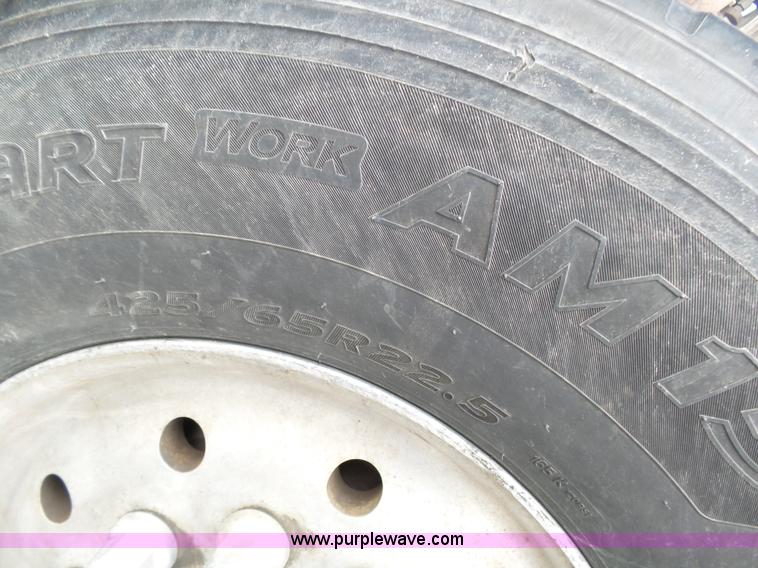 image for item K1339 1997 Mack RD690S roll off truck