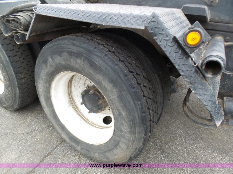 image for item K1339 1997 Mack RD690S roll off truck