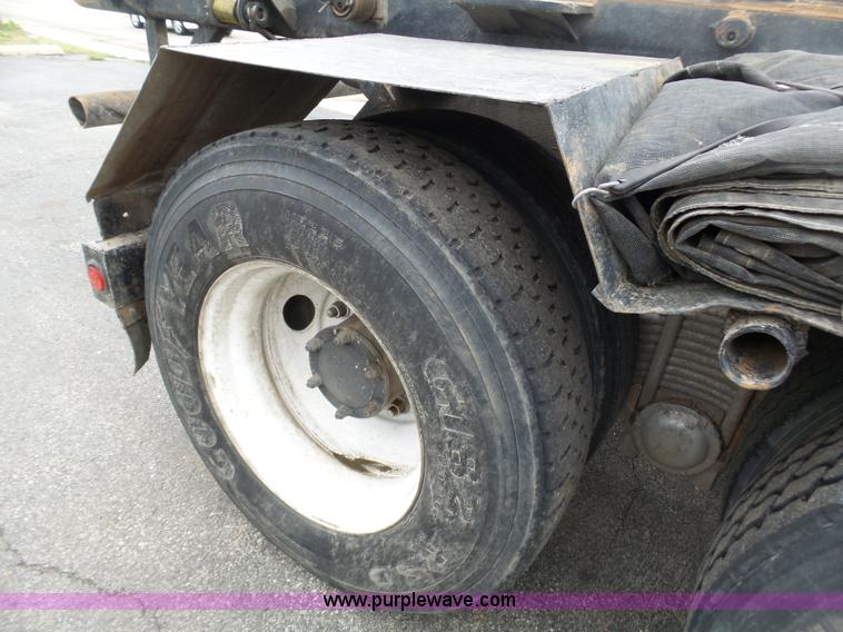 image for item K1339 1997 Mack RD690S roll off truck