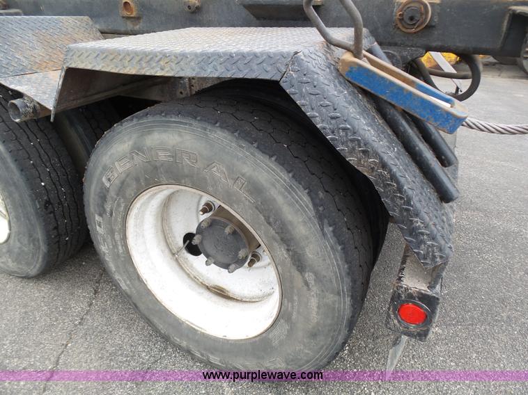 image for item K1339 1997 Mack RD690S roll off truck