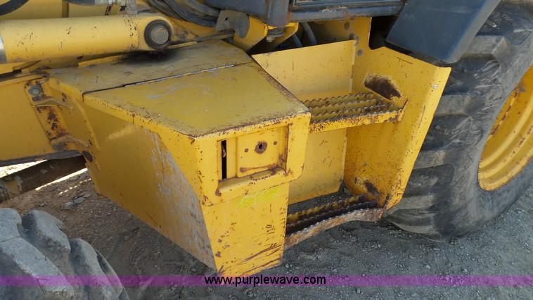 image for item K4200 2006 John Deere 310SG backhoe