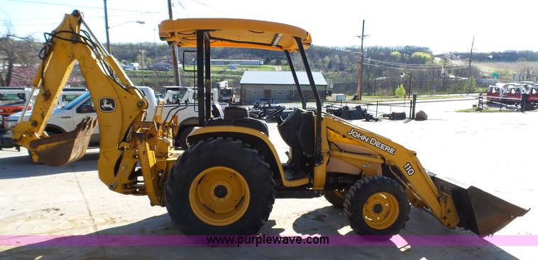 image for item K4207 2001 John Deere 110 backhoe