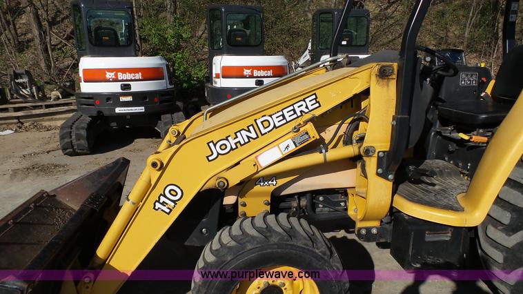 image for item K4207 2001 John Deere 110 backhoe