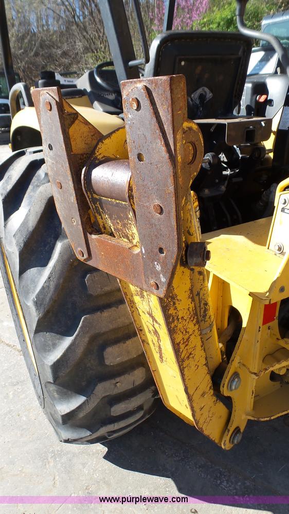 image for item K4207 2001 John Deere 110 backhoe