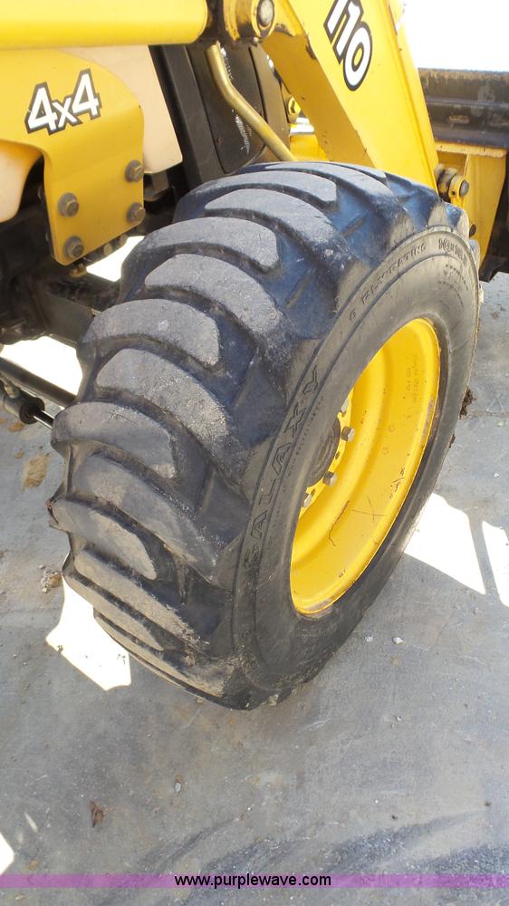 image for item K4207 2001 John Deere 110 backhoe