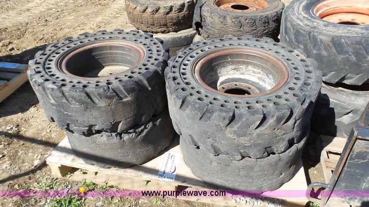 image for item K4222 (4) solid flex skid steer tires