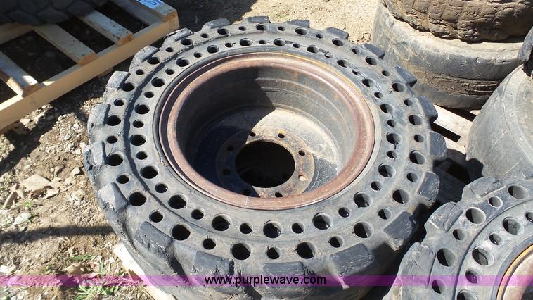 image for item K4222 (4) solid flex skid steer tires