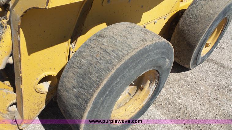 image for item K5142 2000 John Deere 260 skid steer