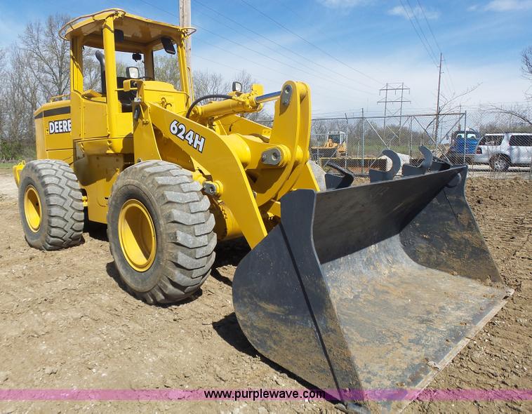image for item L7209 1999 John Deere 624H wheel loader
