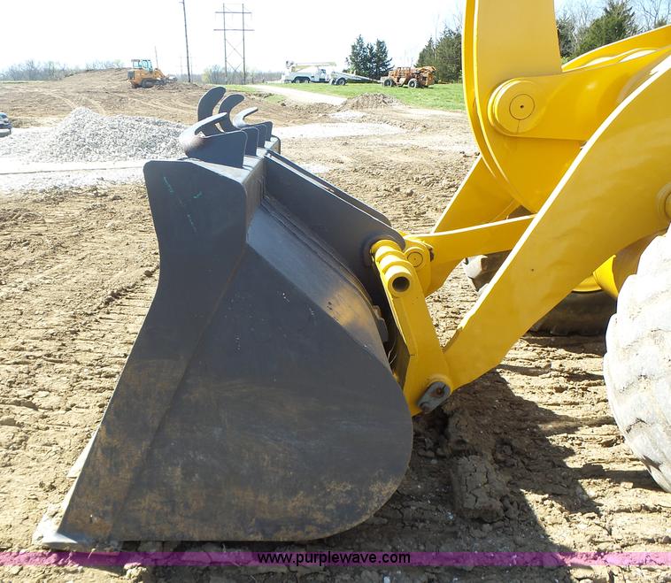 image for item L7209 1999 John Deere 624H wheel loader