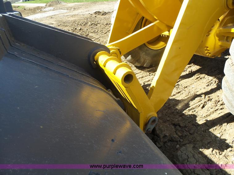 image for item L7209 1999 John Deere 624H wheel loader