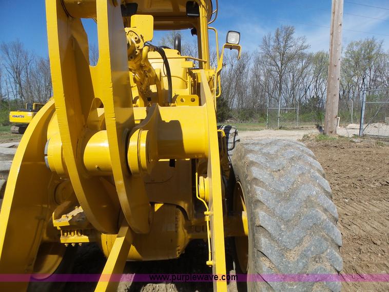 image for item L7209 1999 John Deere 624H wheel loader