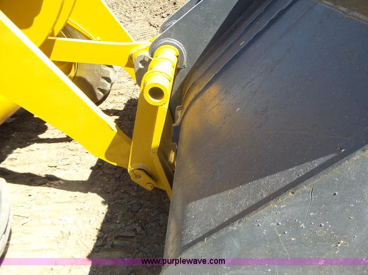 image for item L7209 1999 John Deere 624H wheel loader