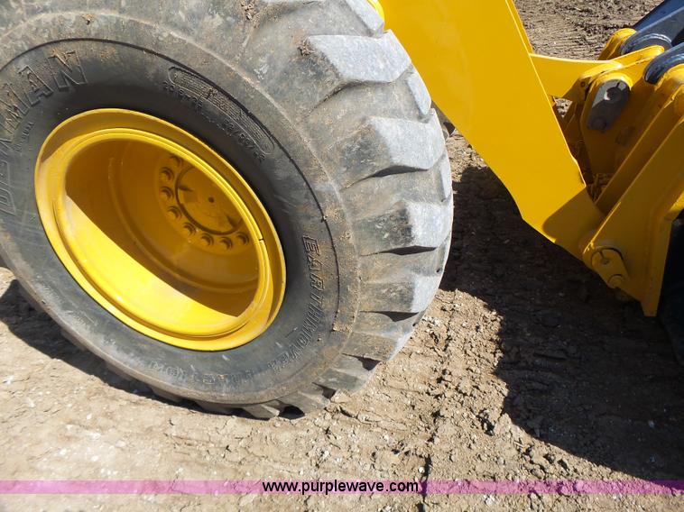 image for item L7209 1999 John Deere 624H wheel loader