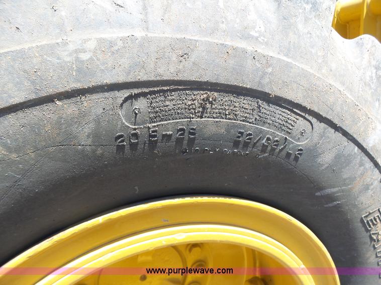 image for item L7209 1999 John Deere 624H wheel loader