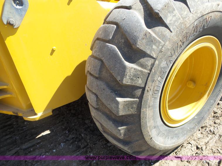 image for item L7209 1999 John Deere 624H wheel loader