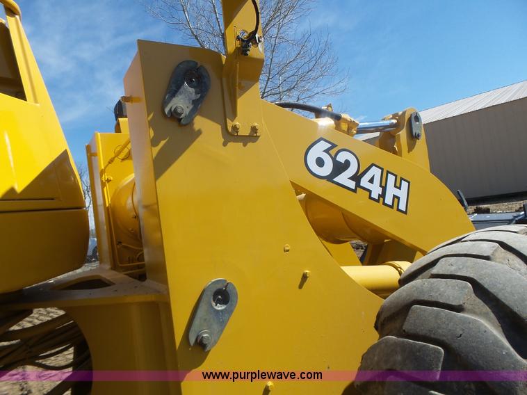 image for item L7209 1999 John Deere 624H wheel loader