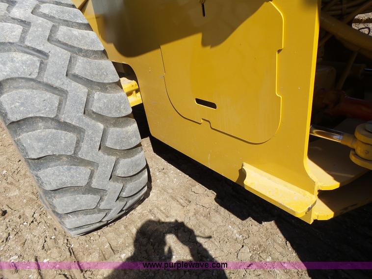 image for item L7209 1999 John Deere 624H wheel loader