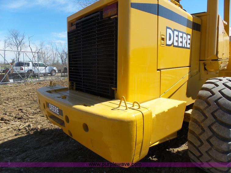 image for item L7209 1999 John Deere 624H wheel loader