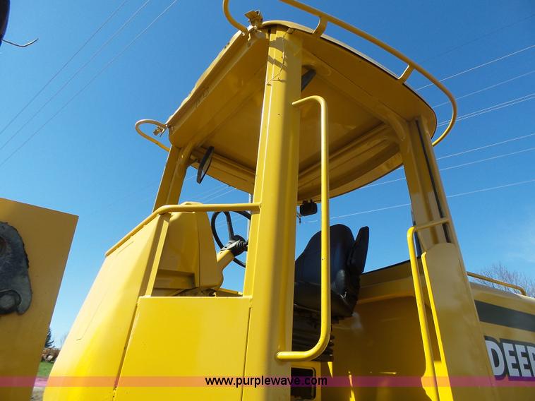 image for item L7209 1999 John Deere 624H wheel loader