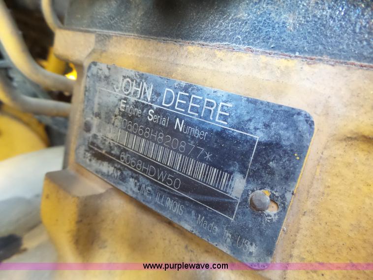 image for item L7209 1999 John Deere 624H wheel loader