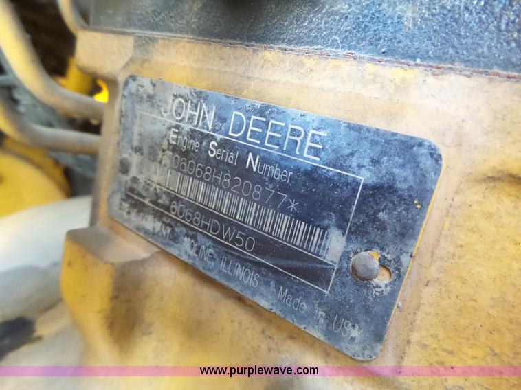 image for item L7209 1999 John Deere 624H wheel loader