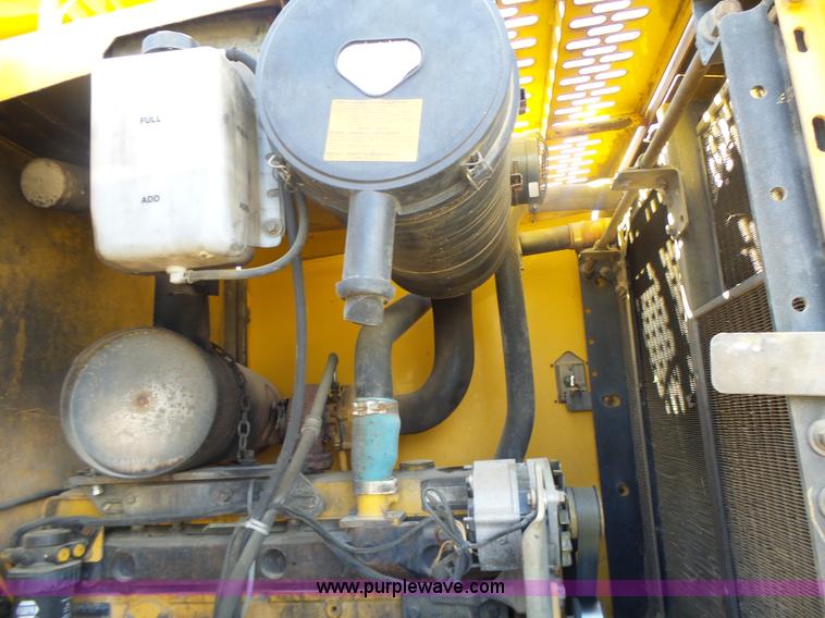 image for item L7209 1999 John Deere 624H wheel loader