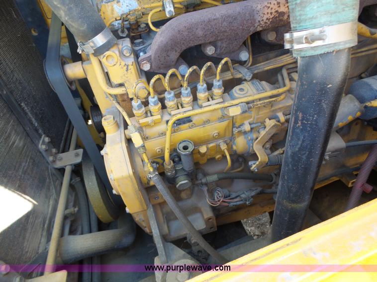 image for item L7209 1999 John Deere 624H wheel loader