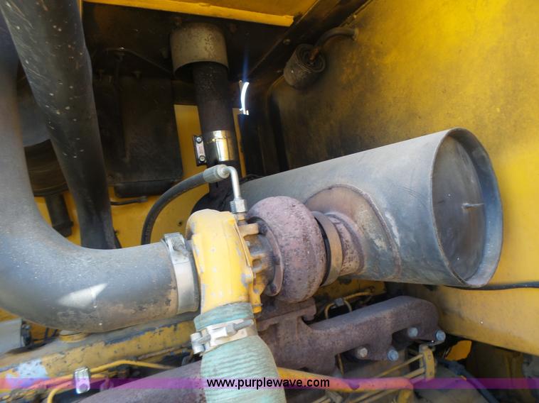 image for item L7209 1999 John Deere 624H wheel loader