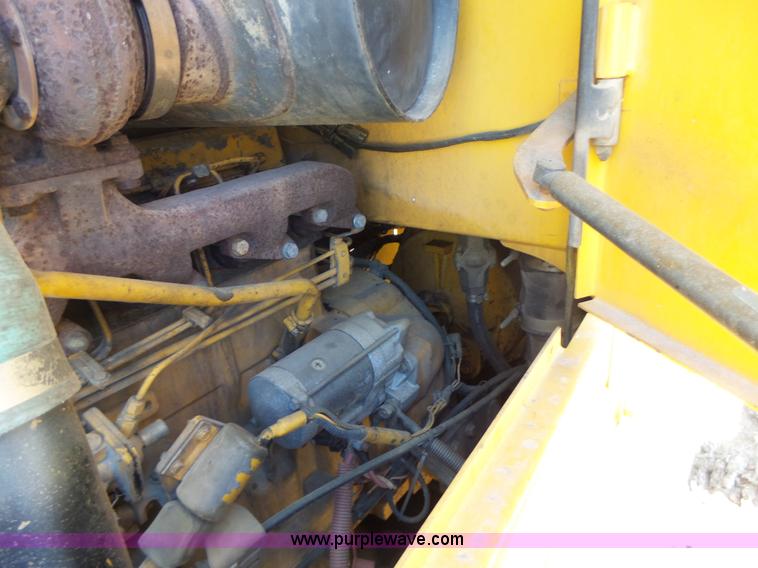 image for item L7209 1999 John Deere 624H wheel loader