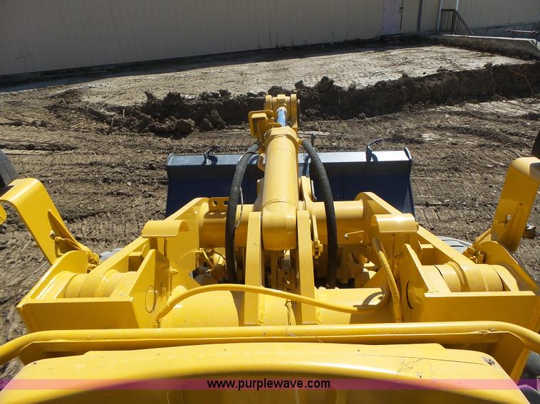 image for item L7209 1999 John Deere 624H wheel loader