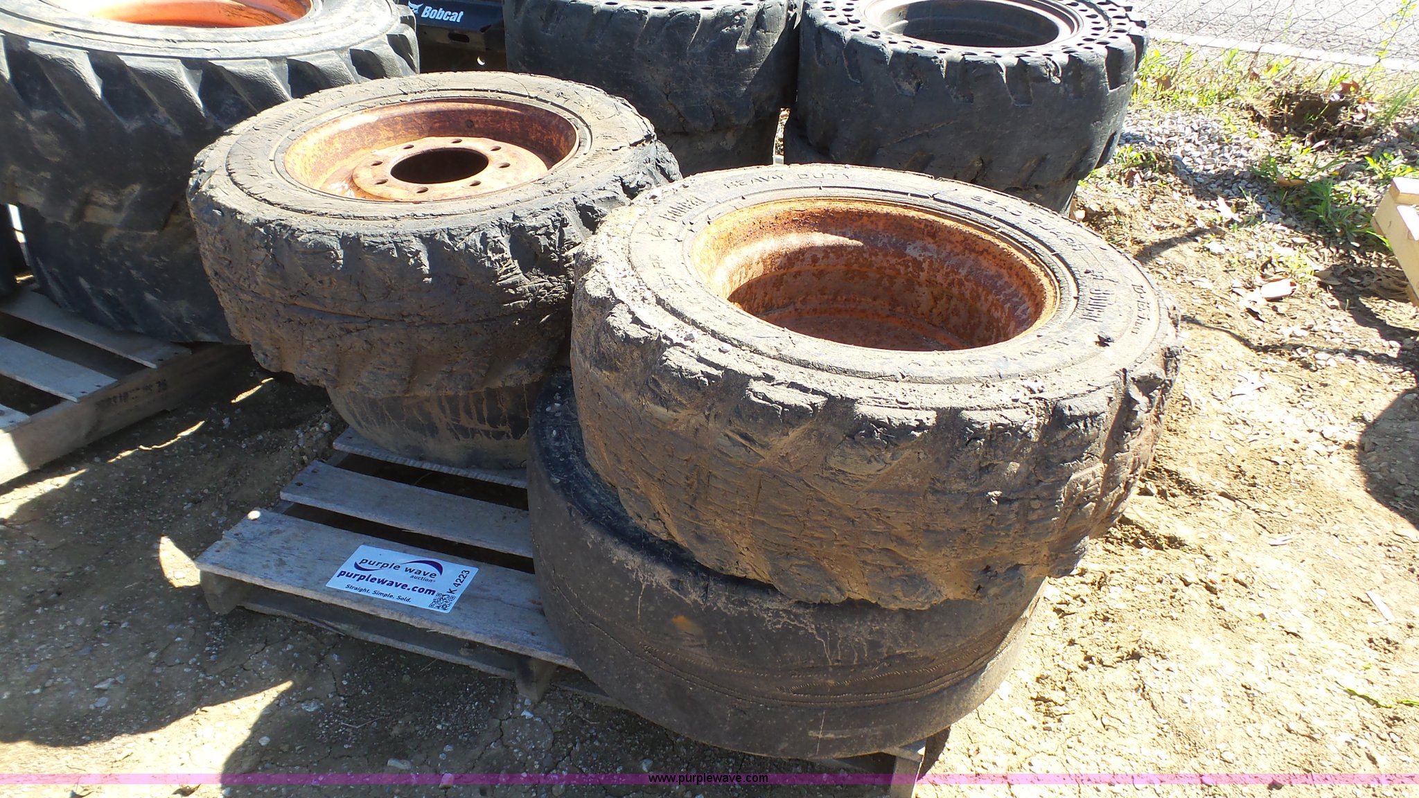 (4) foam filled skid steer tires in Blue Springs, MO Item K4223 sold Purple Wave