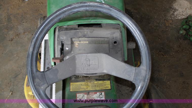 image for item BX9069 (2) lawn mowers