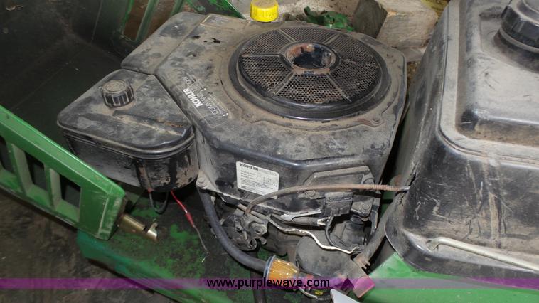 image for item BX9069 (2) lawn mowers