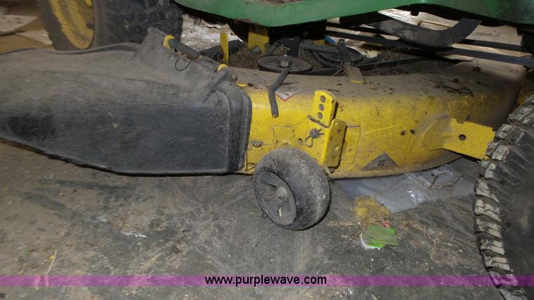 image for item BX9069 (2) lawn mowers