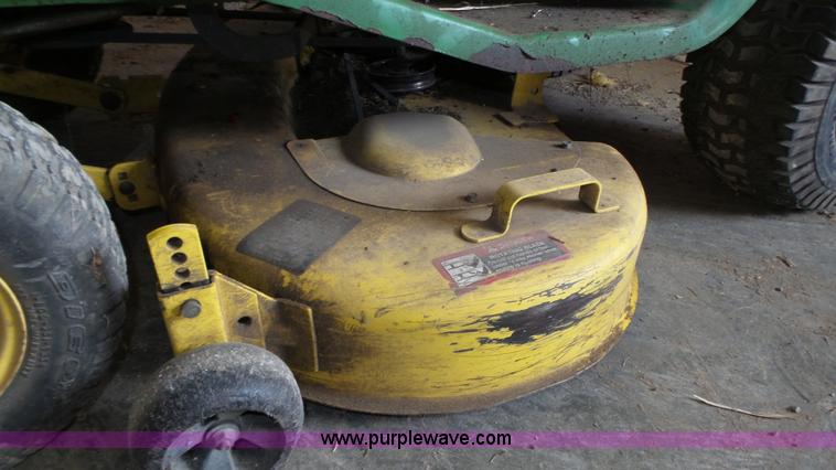 image for item BX9069 (2) lawn mowers