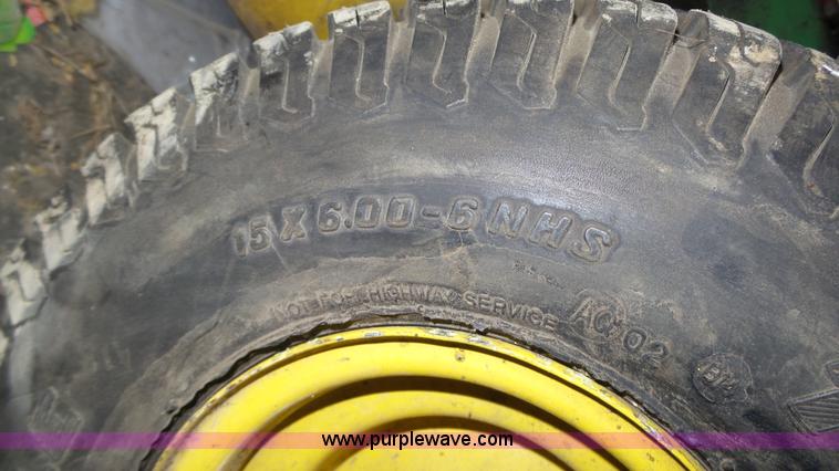 image for item BX9069 (2) lawn mowers