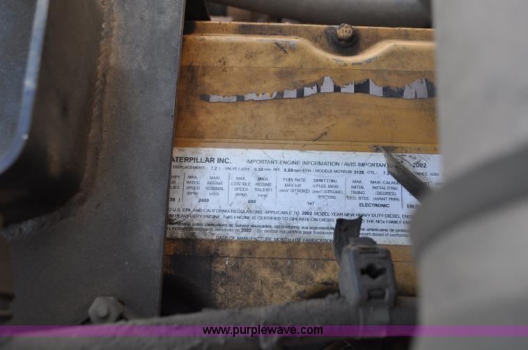 image for item G7350 2002 Peterbilt 330 rollback truck