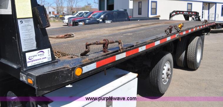 image for item G7350 2002 Peterbilt 330 rollback truck