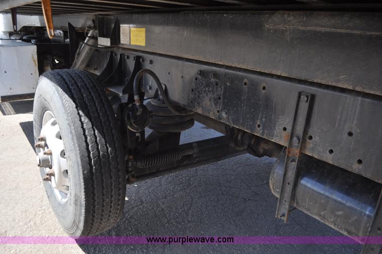 image for item G7350 2002 Peterbilt 330 rollback truck