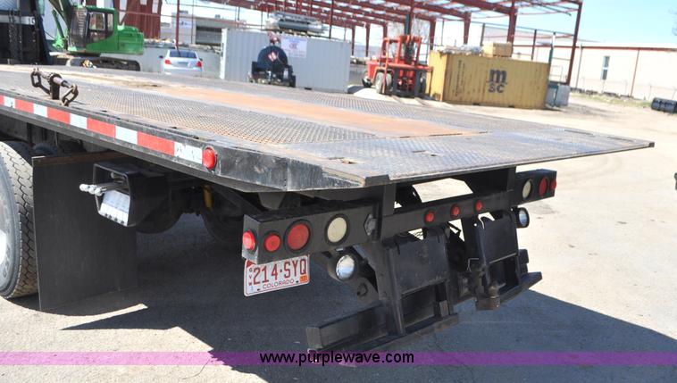 image for item G7350 2002 Peterbilt 330 rollback truck