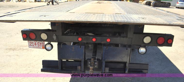 image for item G7350 2002 Peterbilt 330 rollback truck