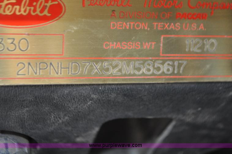 image for item G7350 2002 Peterbilt 330 rollback truck