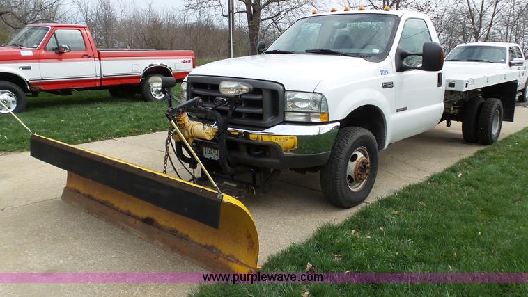 image for item K1332 2004 Ford F350 Super Duty dump flatbed pickup truck