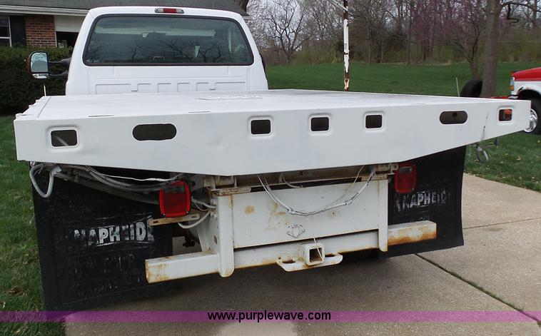 image for item K1332 2004 Ford F350 Super Duty dump flatbed pickup truck