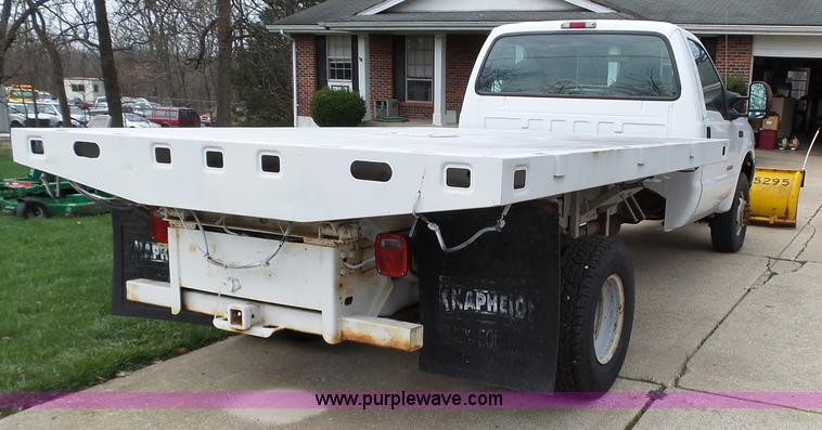 image for item K1332 2004 Ford F350 Super Duty dump flatbed pickup truck