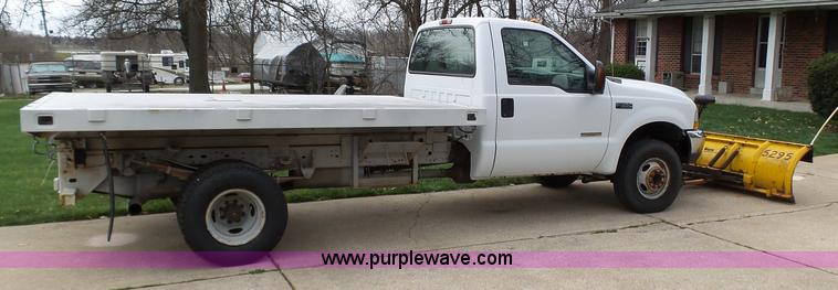 image for item K1332 2004 Ford F350 Super Duty dump flatbed pickup truck