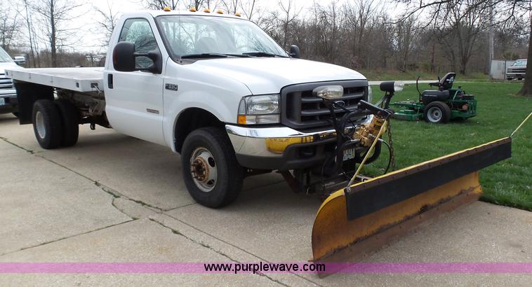 image for item K1332 2004 Ford F350 Super Duty dump flatbed pickup truck