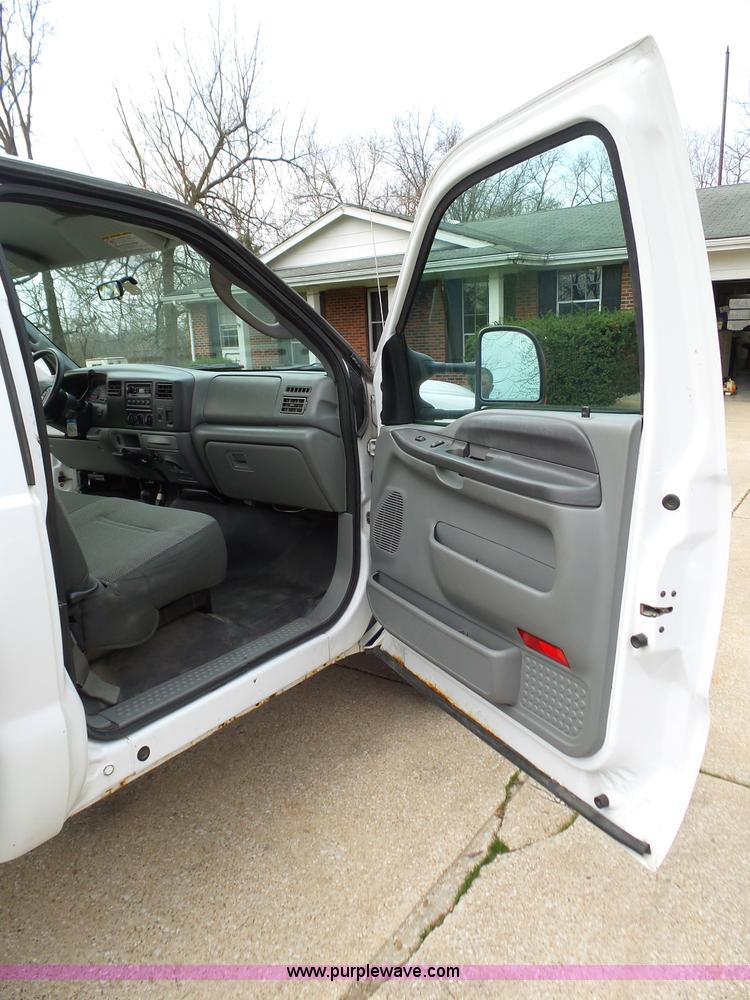 image for item K1332 2004 Ford F350 Super Duty dump flatbed pickup truck