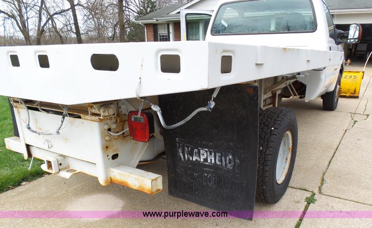 image for item K1332 2004 Ford F350 Super Duty dump flatbed pickup truck